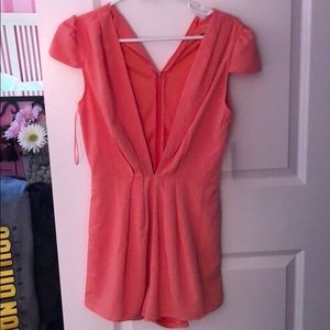 Deep V coral romper!